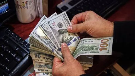 الدولار يتجاوز 56 جنيهاً مصرياً لأول مرة في تاريخه